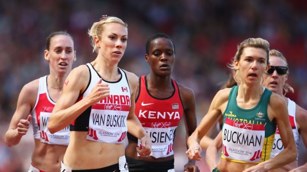 Kate van Buskirk of Canada and Zoe Buckman of Australia lead the field in round one of the women's 1500 metres on Monday.
