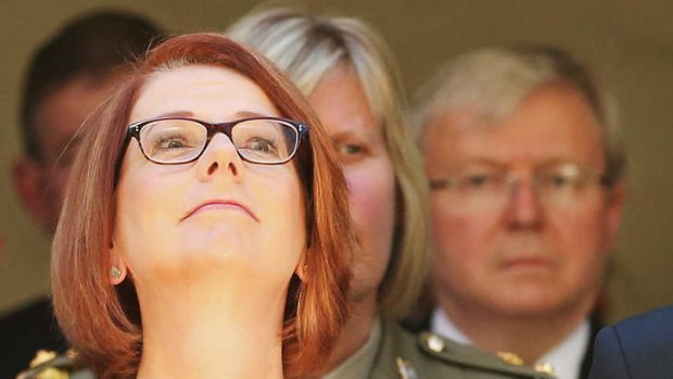 Behind you! Prime Minister Julia Gillard and Kevin Rudd, right.