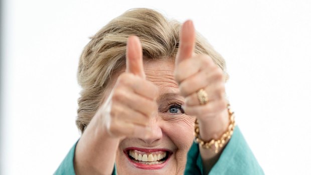 Hillary Clinton gives two thumbs up as she takes the stage to speak at a rally in Pembroke Pines, Florida.