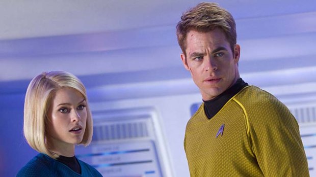 Deadpan touches: Chris Pine, with Alice Eve as Dr Carol Marcus, brings energy to the role of Kirk.