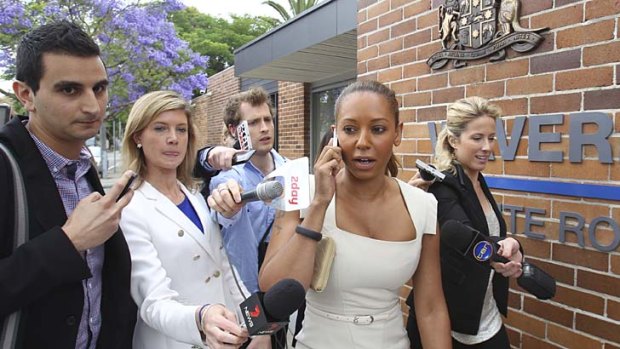 Brief appearance ... X Factor judge and former Spice Girl Mel B leaves Waverley Local Court after a hearing over an apprehended violence order.