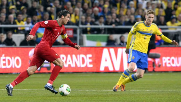 Cristiano Ronaldo terrorises the Sweden defence.