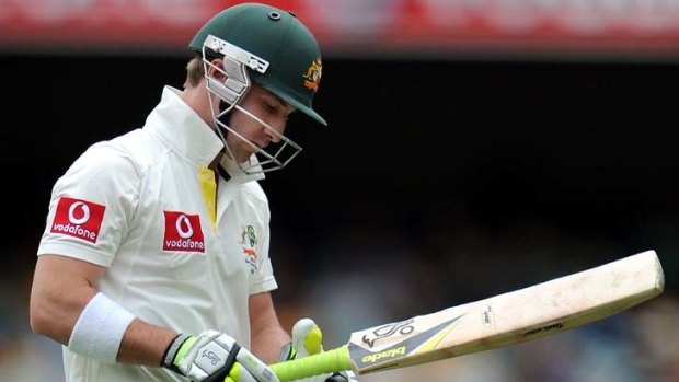 Another chance ... Australian opening batsman Phillip Hughes walks off after been dismissed at the Gabba.