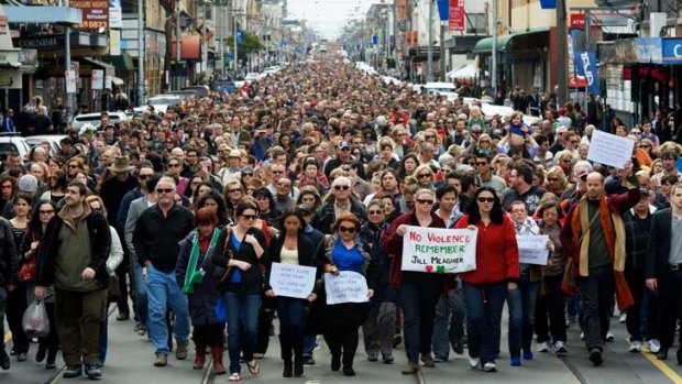 Thousands of people march down Sydney Road in Brunswick.