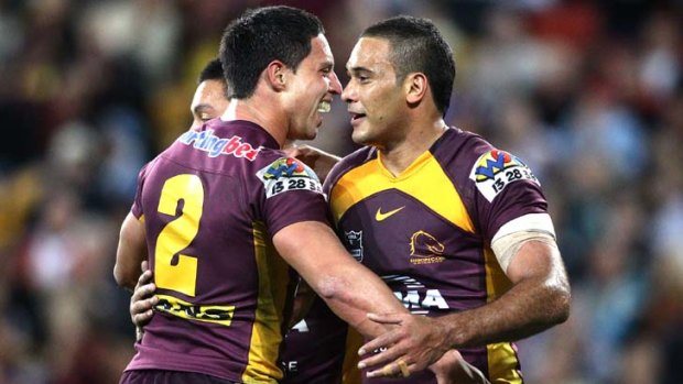 Strike weapon &#8230; Justin Hodges is congratulated after scoring on Friday night.