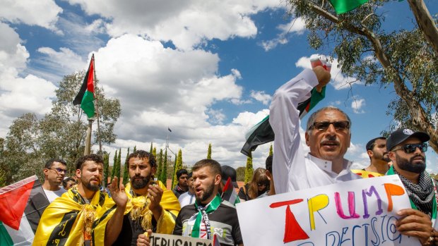Community members from mixed faiths rally in front of the US embassy in Canberra to protest US President Donald Trump's decision to move the US embassy from Tel Aviv to Jerusalem. Photo: Sitthixay Ditthavong