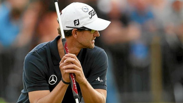 Adam Scott reacts to his missed par putt on the 18th green during the final round of the British Open. The missed putt cost him a chance at a play-off.