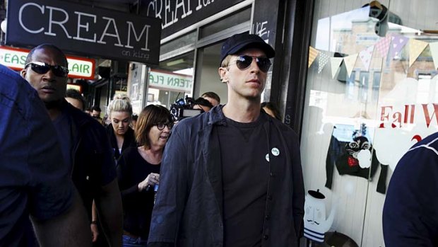 Coldplay's Chris Martin strolls along King Street in Newtown, where the band is to shoot a film clip.