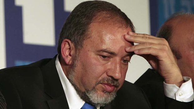 Resigned ... Avigdor Lieberman vows to clear his name.