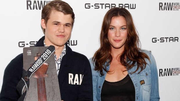 Making chess fashionable: Magnus Carlsen with actress Liv Tyler.