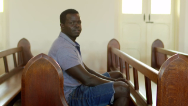 Ayik, pictured, was stunned to come across the man who tortured him.