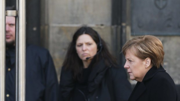 German Chancellor Angela Merkel arrives for the memorial service.