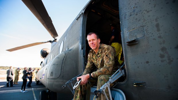 Flight Engineer Sergeant Craig Hartnett with the Chinook CH-47D that has been given to the Australian War Memorial by the Australian Army. Date: April 19 2016
The Canberra Times
Photo: Elesa Kurtz