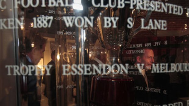 Trophies ... Tony Abbott takes in the glory of the Essendon Football Club’s hall of fame.