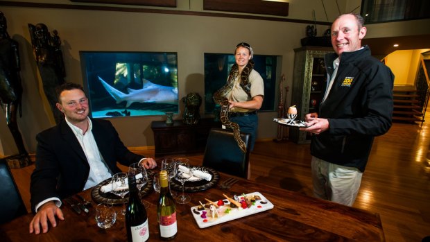 The Truffle Farm owner Jayson Mesman with the National Zoo and Aquarium zoo guide Alicia Perritt with 'Bernice' and Jamala Wildlife Lodge CEO Maurits de Graeff at Jamala Wildlife Lodge.