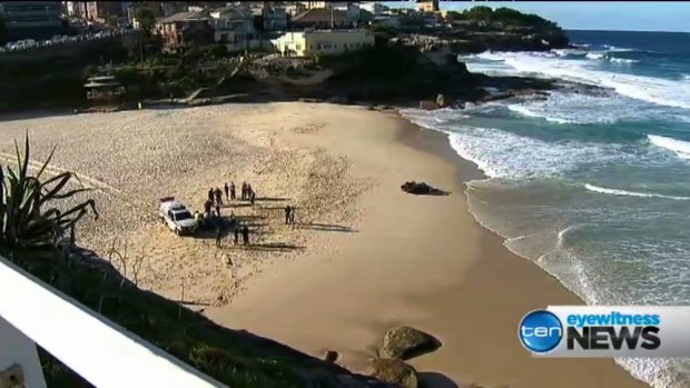 The scene at Tamarama Beach, where a surfer died after being swept on to rocks.