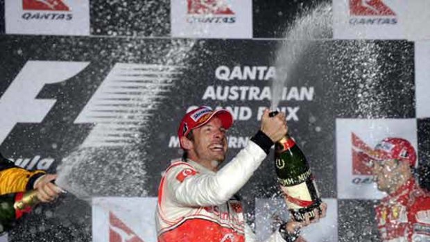 Spray time ... Jenson Button celebrates his victory in yesterday’s Grand Prix, having seen off Sebastian Vettel, Felipe Massa and Mark Webber.