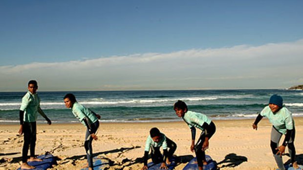 Catch a wave ... indigenous children from Brewarrina learn how to surf at Maroubra Beach as part of the No-Way anti-drugs campaign.