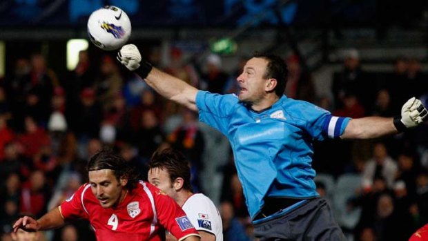 Reds hero &#8230; Adelaide's Eugene Galekovic makes a save in the Asian Champions League game against Nagoya Grampus.