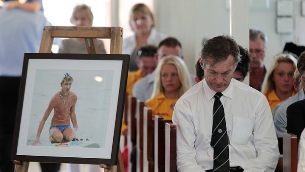 A mourner at the funeral for Matt Barclay.