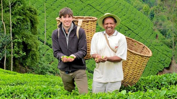 Simon Reeve joins tea farmer Samuel Tibi for a tea-plucking lesson at Samuel's farm near Kagwe, Kenya.
