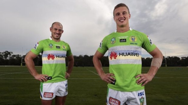 Raiders halves Terry Campese and Jack Wighton show off Canberra's special heritage jersey, whcih they will wear against Penrith.