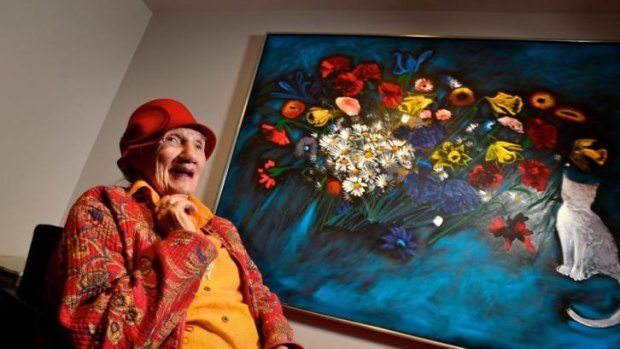 Barbara Blackman with a painting that she has gifted to the Melbourne Recital Centre.
