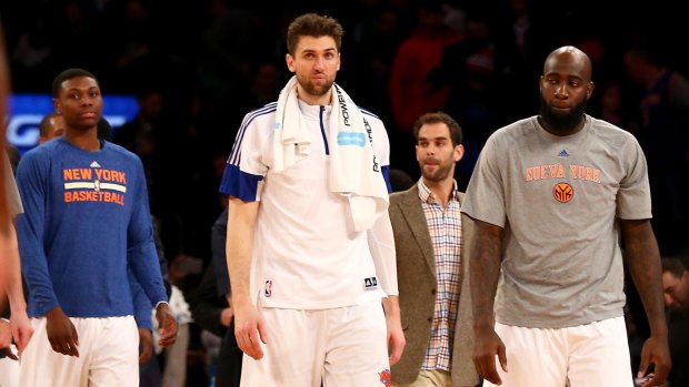 Tough times New York Knicks players walk off the court during one of their many losses at Madison Square Garden last season.