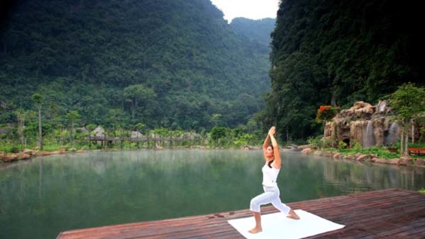 Water therapy ... Banjaran Hotsprings Retreat near Ipoh. A waterside setting for yoga.