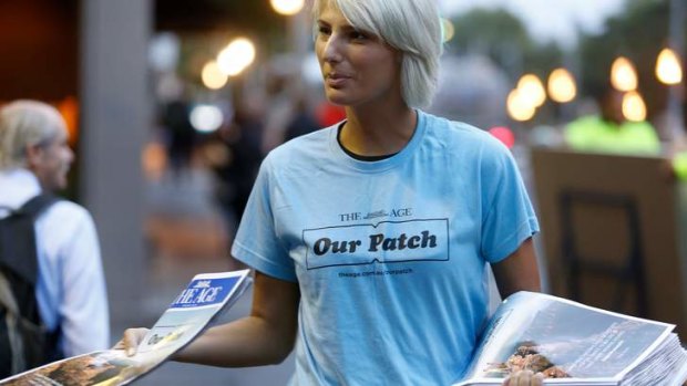 The Age's 'Our Patch edition' is handed out at train stations around Melbourne.