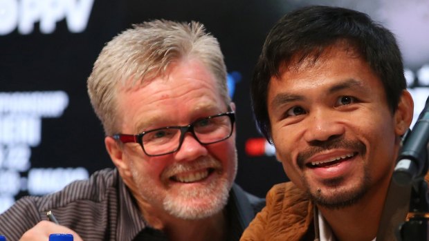 Advice:  Trainer Freddie Roach with Manny Pacquiao.