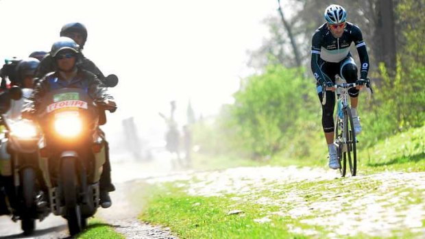 Hard road: The infamous cobblestone section of the Paris-Roubaix classic that forms part of the Tour de France route next year.