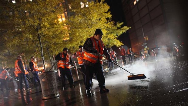 Clean-up ... workers clear Zuccotti Park.