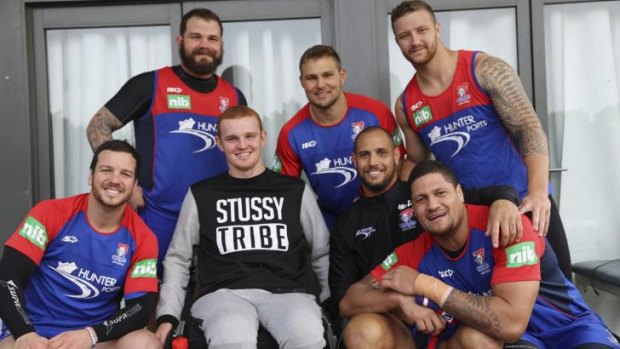 Special guest: Alex McKinnon dropped in at Newcastle Knights training on Saturday, pictured with (back) Adam Cuthbertson, Robbie Rochow, Korbin Sims, (front) Jarrod Mullen, Jeremy Smith and Willie Mason.