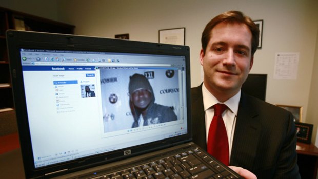 Assistant US Attorney Michael Scoville displays Maxi Sopo's Facebook page.