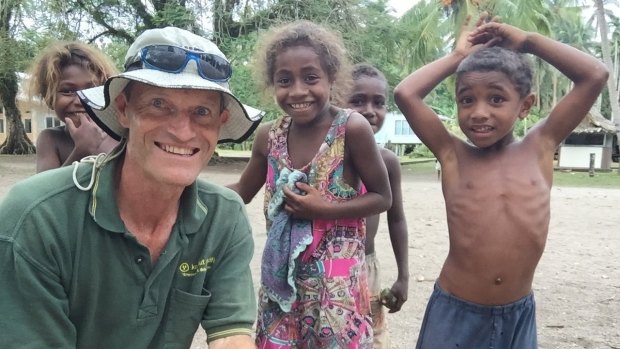 Kokonut Pacific's Richard Etherington with children in the Solomon Islands.