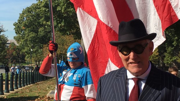 Roger Stone at a pro-Trump protest in Washington, DC, with "Captain America". 
