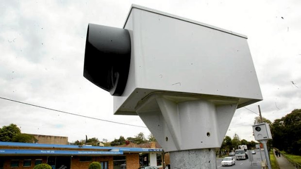 A red light and speed camera on the corner of Harp and Burke roads in Kew.