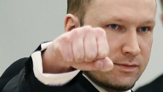 Anders Behring Breivik makes a right-wing salute at the start of the third day of his trial in Oslo.