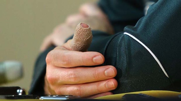 Michael Clarke's bandaged thumb.