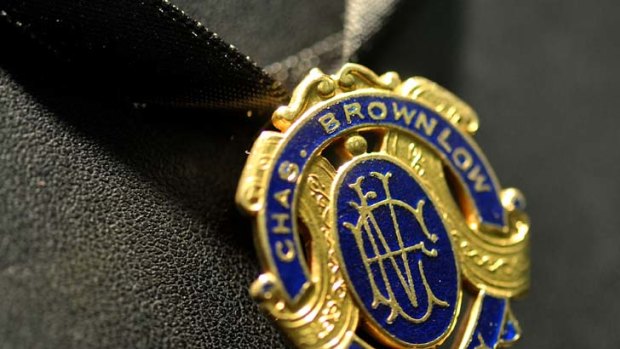 The first Brownlow Medal, won in 1924 by Edward Greeves, sells for $170,000.