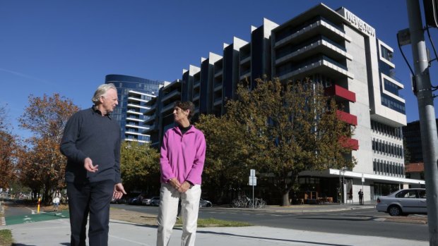 New Acton South resident Roger Smith and New Acton East resident Maureen Hay are after a more reasonable approach by short-term guests that recognises  the development is a residential area.