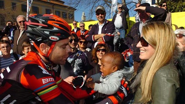 Dream denied ...Cadel Evans with his family.