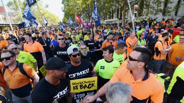 Workers in Melbourne marched to to protest  against the Federal Government's new tough building code, the reintroduction of the Australian Building and Construction Commission and planned penalty rate cuts