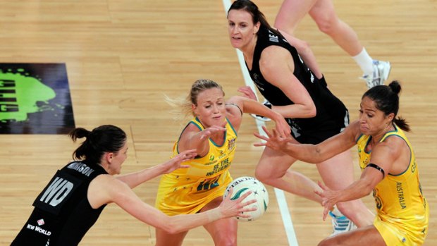 Australia's Kim Green and Mo'onia Gerrard battle New Zealand’s Anna Harrison.