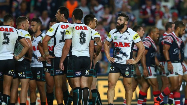 Dejection: Josh Mansour and his Penrith teammates on Monday night.