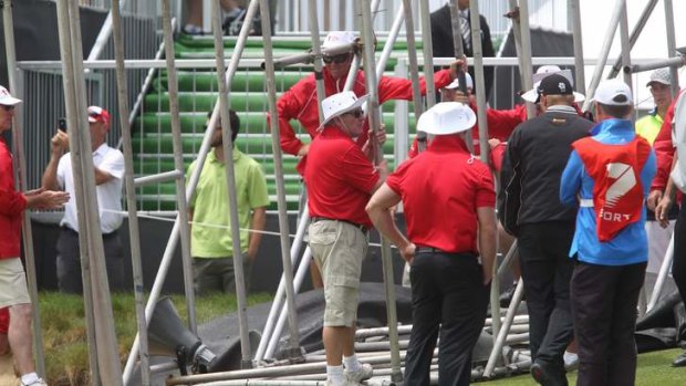 Danger ... TV scaffolding collapses at the 18th hole.