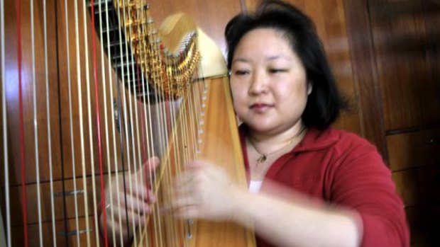 Harpist Verna Lee has turned to other work to makes end meet..