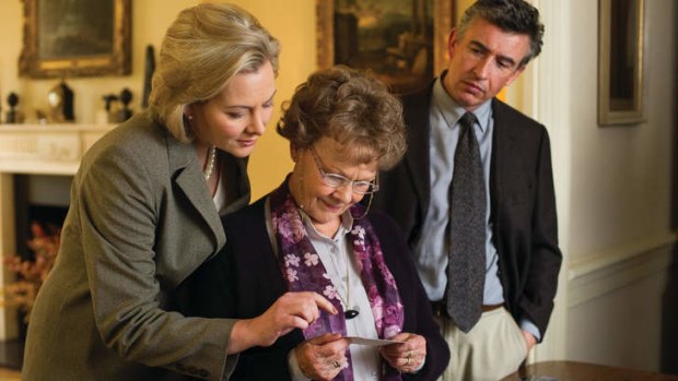 Anti-Catholic? .... Philomena Lee (Judi Dench, centre) and Martin Sixsmith (Steve Coogan, right) with a co-worker of Anthony's, in <i>Philomena</i>.