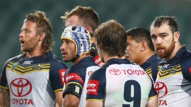 Johnathan Thurston and his Cowboys teammates feel the pain of coming so close to victory.